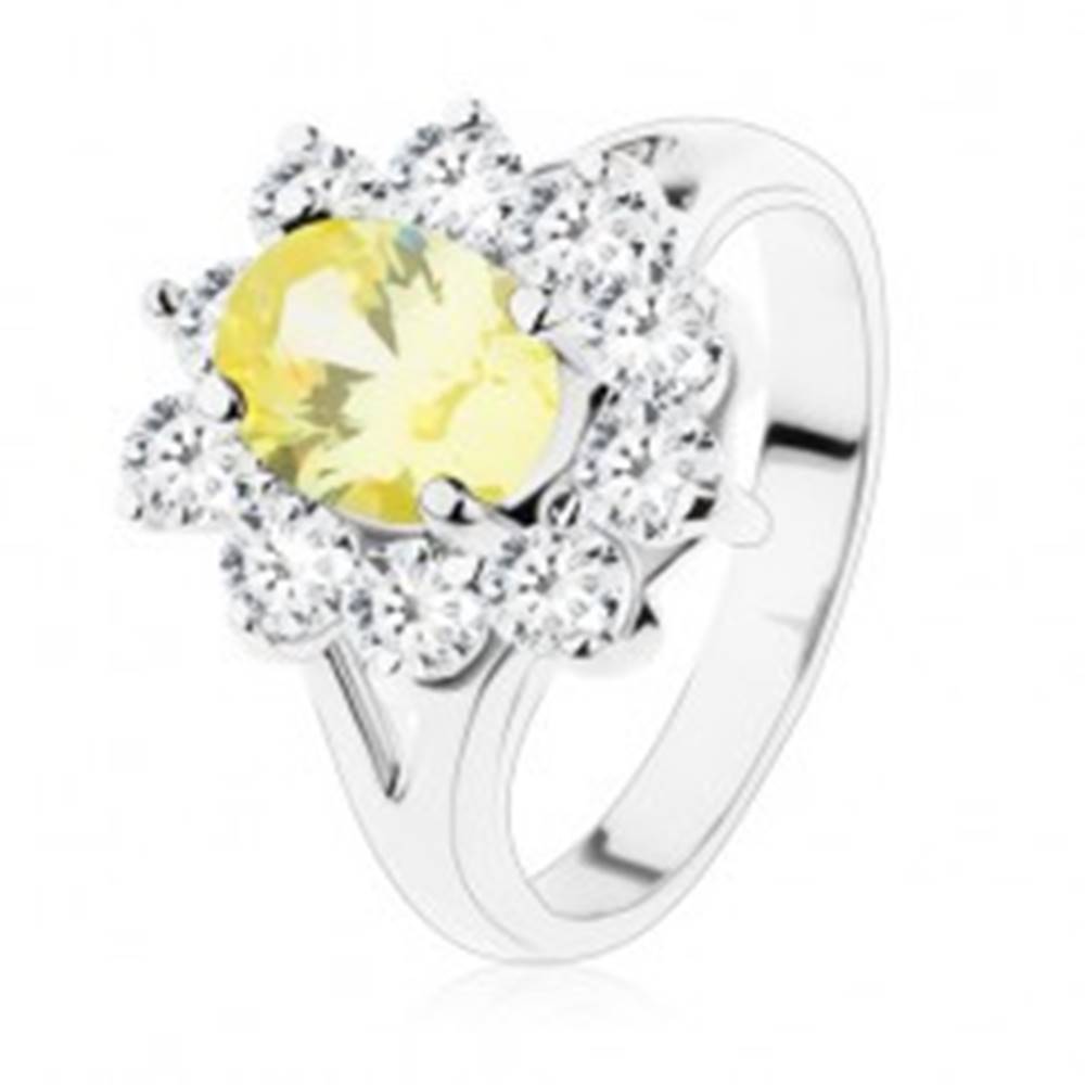 Šperky eshop Ligotavý prsteň v striebornom odtieni, žltý ovál, lemovanie z čírych zirkónov - Veľkosť: 51 mm