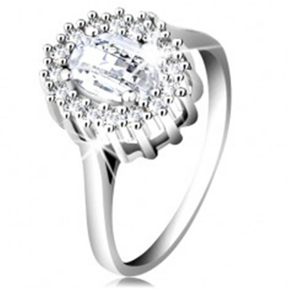 Šperky eshop Zásnubný prsteň zo striebra 925, oválny brúsený zirkón, lem z drobných zirkónikov - Veľkosť: 49 mm